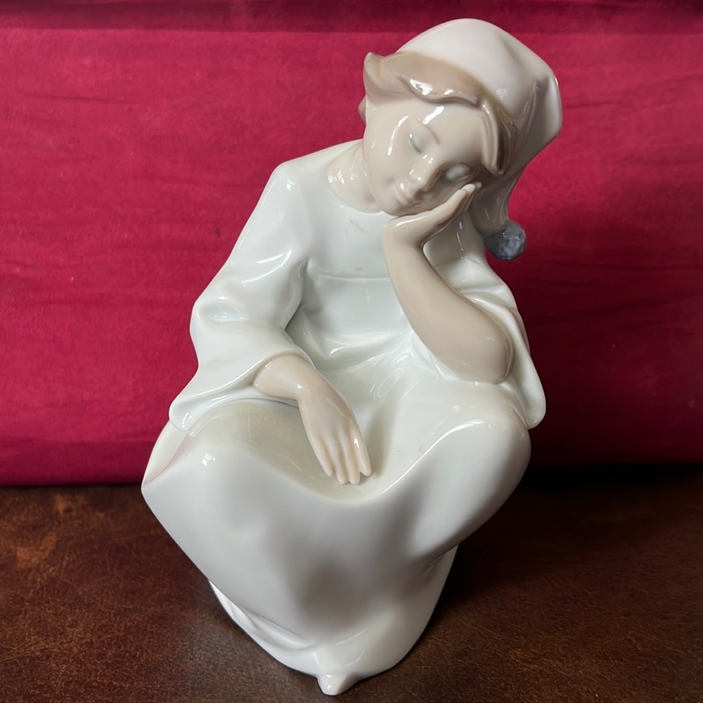 Lladro sleeping child.